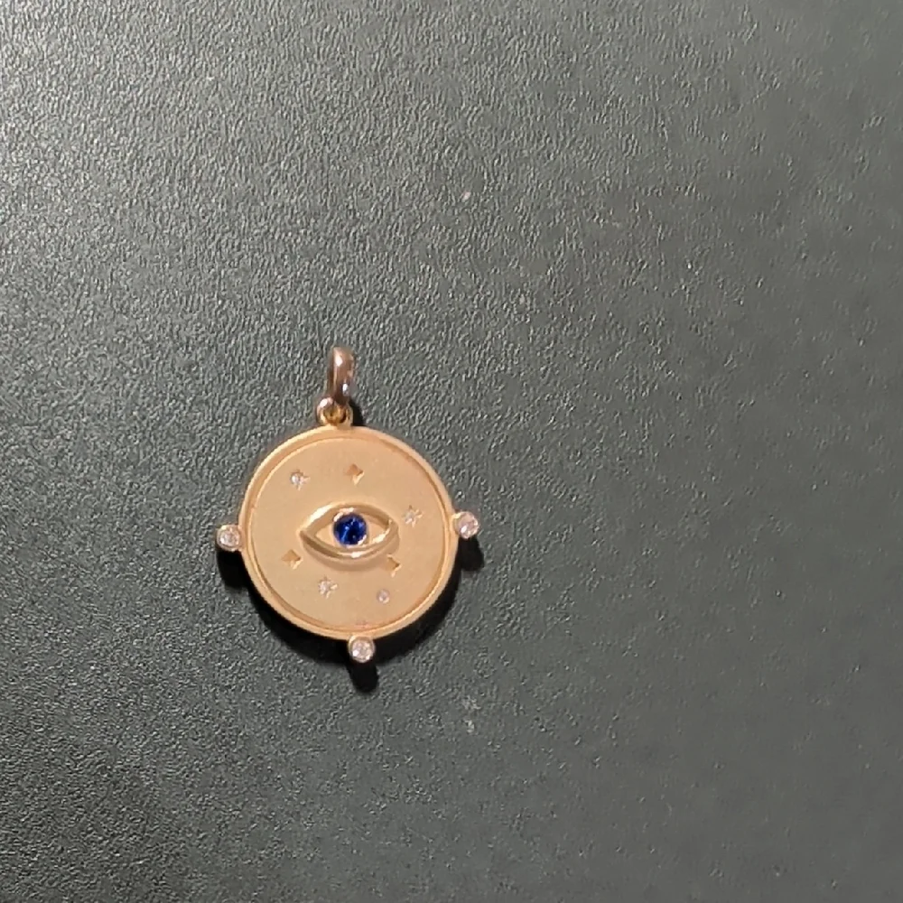 Gold Pendant with Blue Eye Design